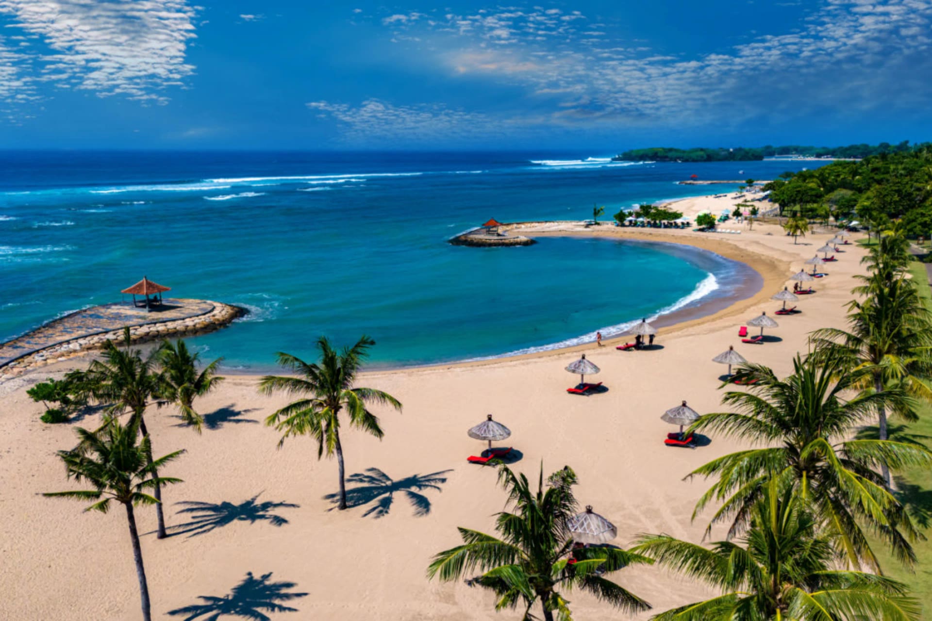 Nusa Dua resort dining terrace with ocean views and elegant table settings